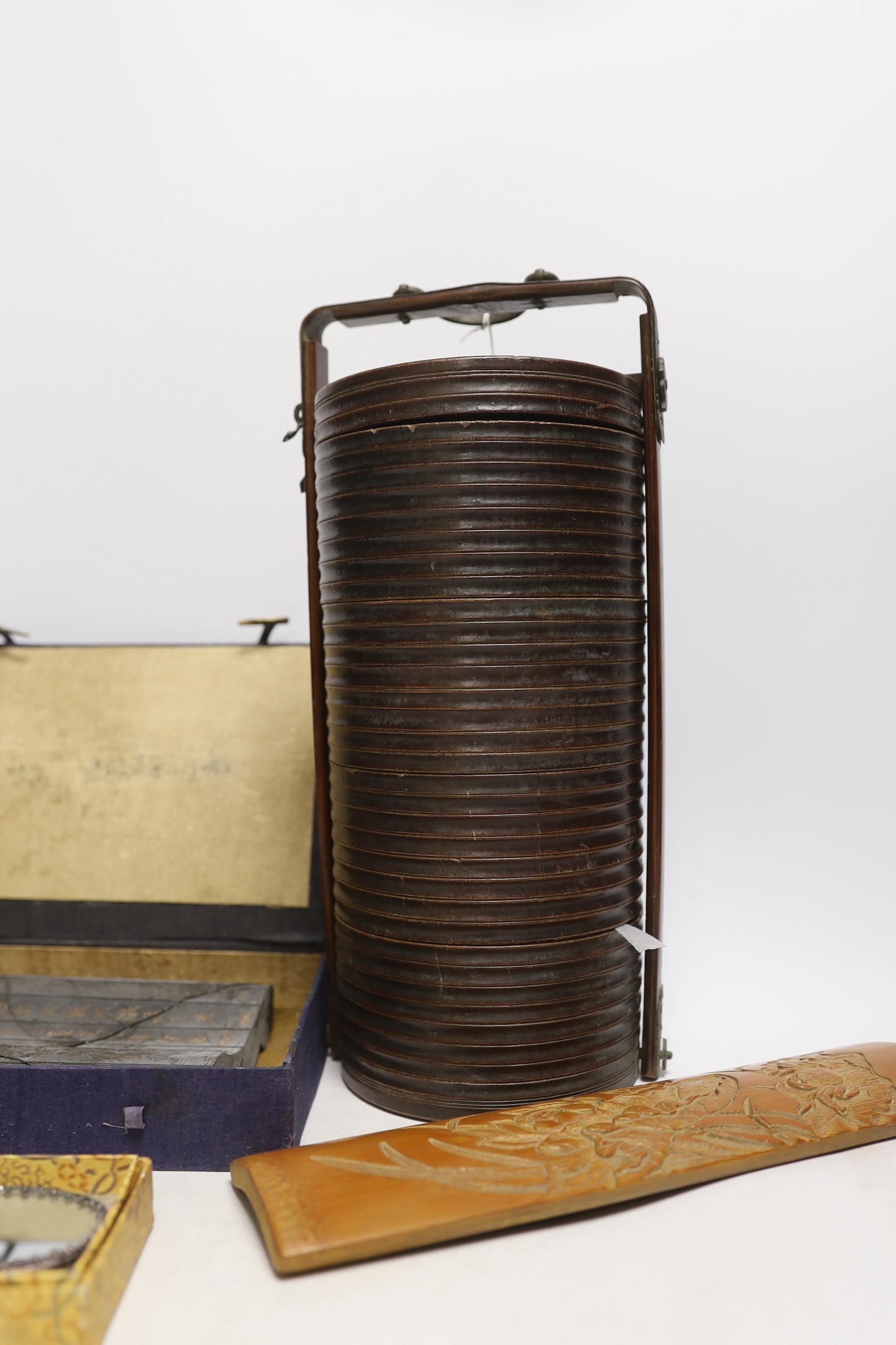 A Chinese ink block, bamboo brushrest, mirror and bamboo stacking box / container, largest 32cm high (4)
